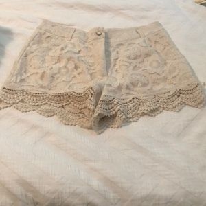 Cream lace shorts with scalloped hem